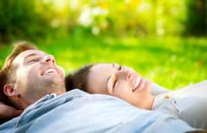  Young-Couple-Lying-on-the-Grass