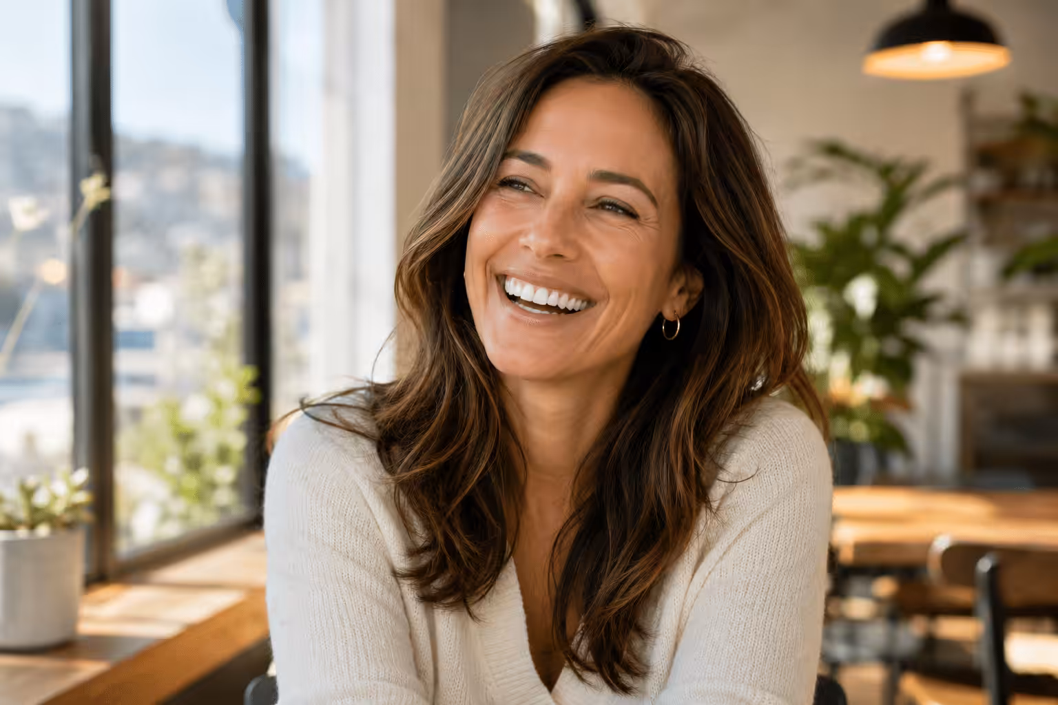 A smiling San Francisco woman after Dental Implants in San Francisco