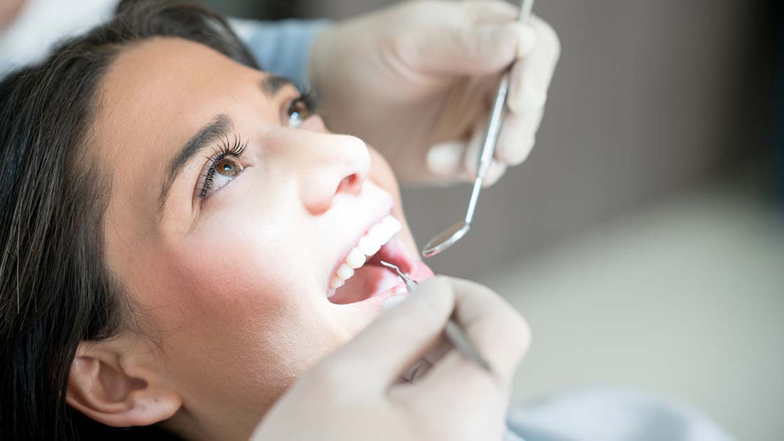 Woman during dental exam